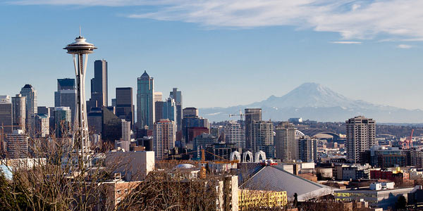 The Seattle Space Needle with Mount Rainier in the background.