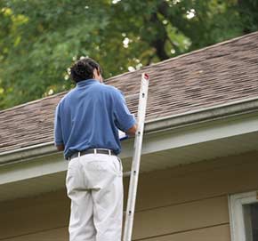 home inspector on roof